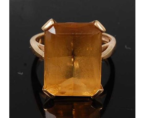 A yellow gold citrine single stone ring, featuring a rectangular cut citrine in a four-claw setting, citrine dimensions appro