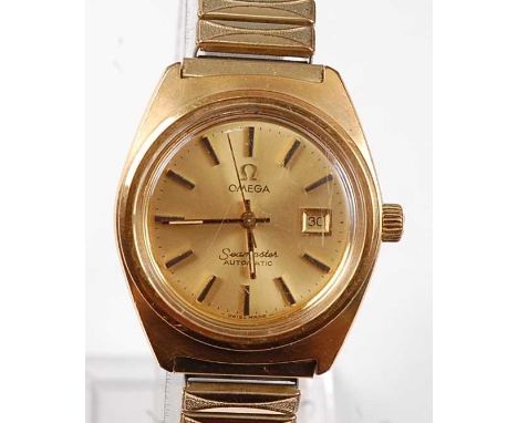 A lady's gold plated Omega Seamaster automatic wristwatch, having round champagne baton dial with sweeping second hand and da
