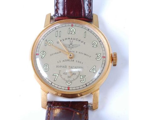 A gent's Russian Sturmanskie gold plated wrist watch having a signed champagne dial with luminous Arabic numerals, subsidiary