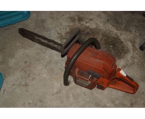 A Husqvarna 254 chainsaw.