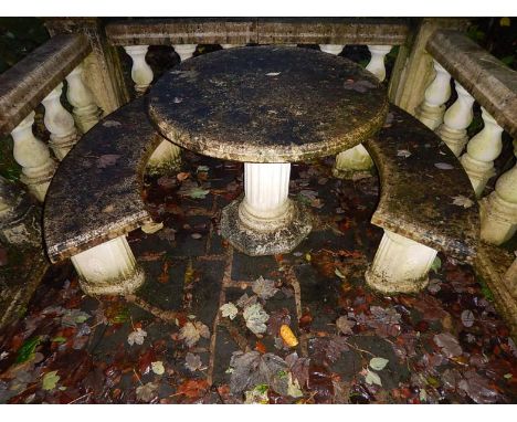 Reconstituted stone ornamental garden table, and a pair of bench seats.