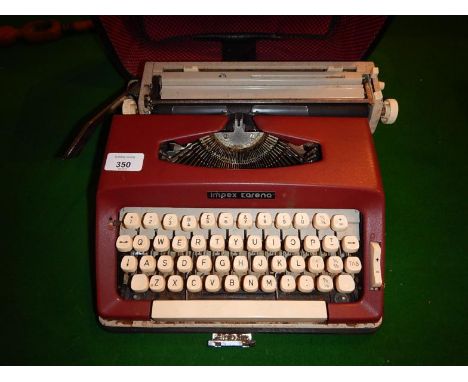 An Impex Karena portable typewriter.