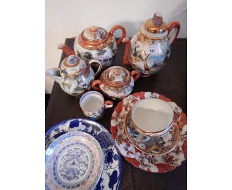 A Japanese tea and coffee pot, with matching sucrier, two cups and saucers, plates, etc.