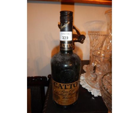 A bottle of Catto's Scotch Whisky.