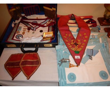 Masonic regalia and aprons, etc, including silk sash with braided ornamentation and jewels.