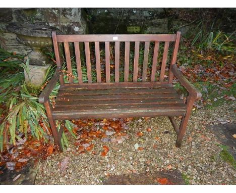 A wooden slatted garden bench seat, 109cm wide.