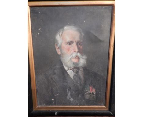 Early 20thC English School. Head and shoulders portrait of a bearded gentleman in formal dress with medals, oil on canvas, in