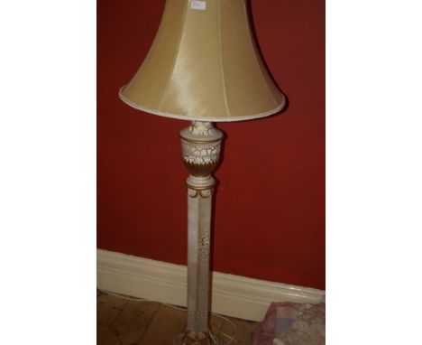 A modern free standing lamp with shade, classical designed.