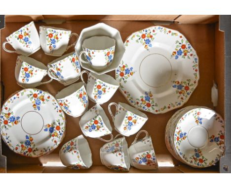 A Sutherland china Art Deco tea service, c1930, of octagonal shape, large plate 22cm, printed mark (36) 