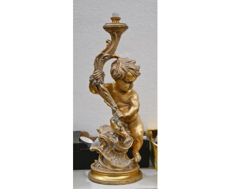 A Baroque inspired gilt and composition table lamp, late 20th c,&nbsp;as a putto, 74cm h&nbsp; Some wear and minor losses. No