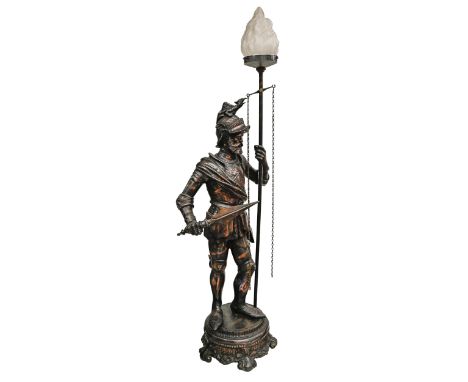 A coppered metal figural lamp, late 20th c,&nbsp;as a Renaissance knight, scroll base, moulded glass flame shade, 118cm h Som