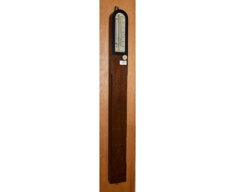 An oak cased stick barometer signed T.B Winter &amp; Son, 21 Grey St