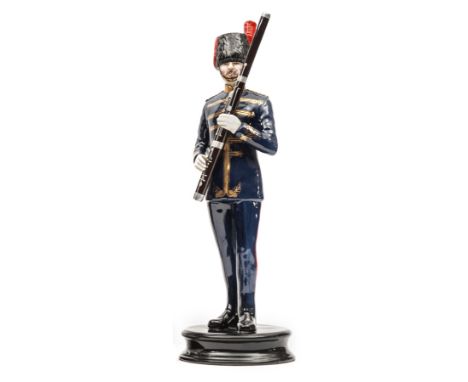 A similar figure of a bandsman “Royal Artillery”, in full dress with bassoon, “Model no 44”, height overall 12”. VGC. Plate 2