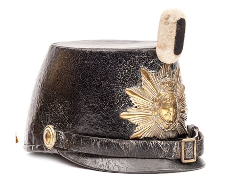 A scarce mid 19th century infantry officer’s shako of the German State of Reuss, of black PL, with brass star HP bearing crow