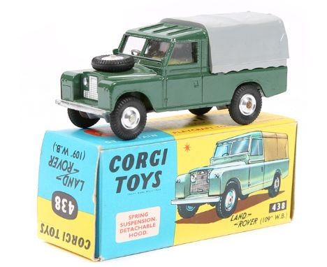 Corgi Toys Land Rover (438). In dark green with yellow interior and grey rear canopy and spun wheels. Boxed, some light creas