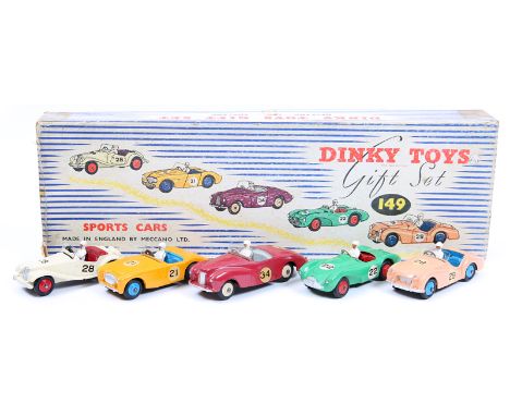 A Dinky Toys Gift Set 149 ‘Sports Cars’. Comprising MG Midget Sports (108) in cream with maroon interior and red wheels RN 28