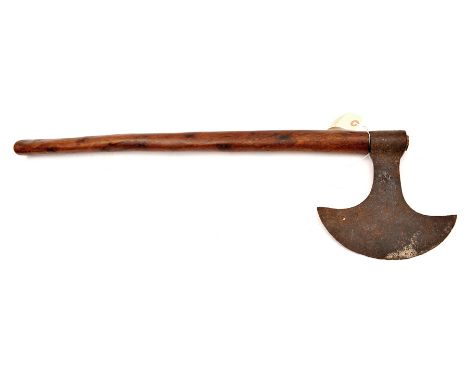 An axe, crescent blade 8½”, with armourer’s mark on one side, plain socket to haft, 33” overall. GC for age (blade heavily pi