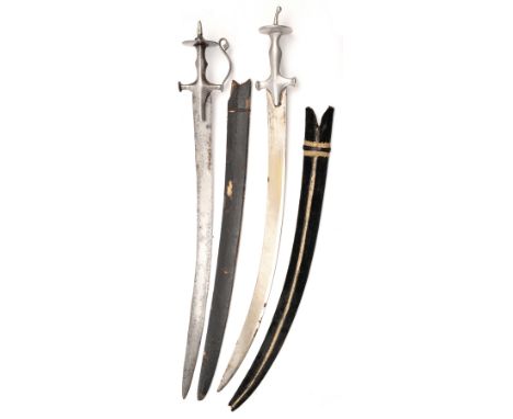 A tulwar, SE blade 32”, iron hilt with long langets, crossguard, knucklebow with curled snake’s head top, disc pommel and spi