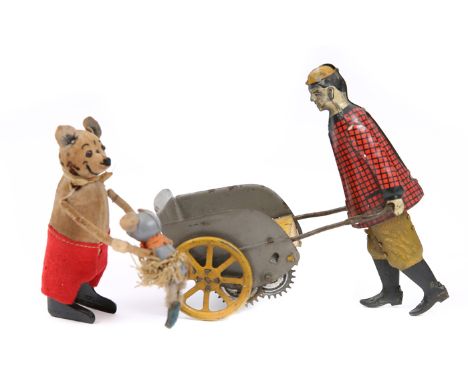 2 clockwork tinplate toys. An American Lehmann style man pushing a clockwork barrow. He is wearing a red/black chequered smoc