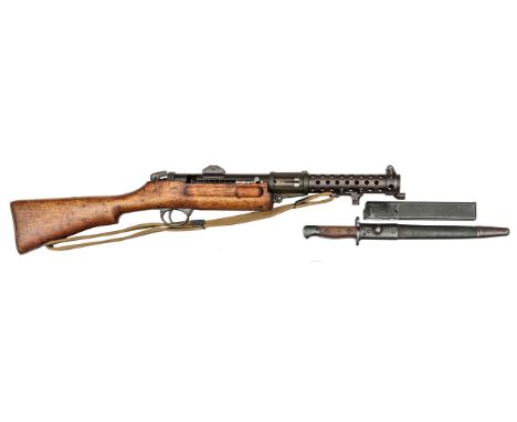 An “old spec” de-activated 9mm Lanchester Mark I submachine gun, number H56271, with magazine, webbing sling, and India patte