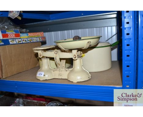An enamel saucepan; cooking dish and set of scales