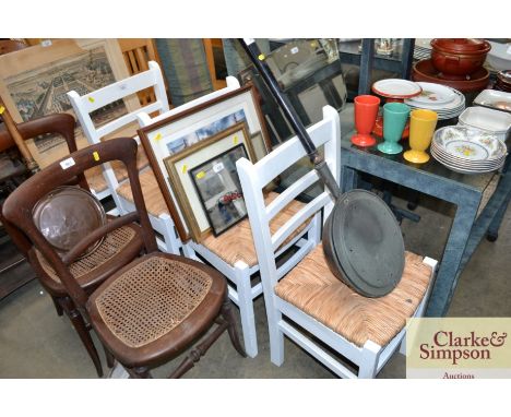 A set of four white painted ladder back chairs
