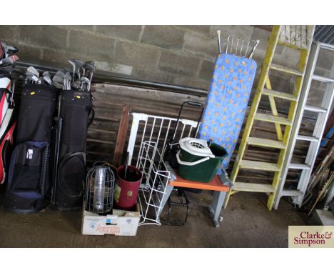 A bird feeder; a baby gate; an ironing board; a kneeling stool etc