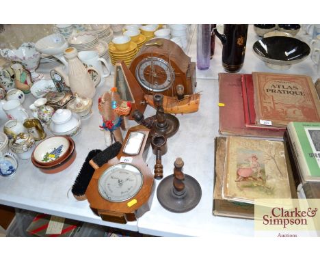 A quantity of various wooden ware to include a metronome; a three hole mantel clock; nut cracker; barometer etc