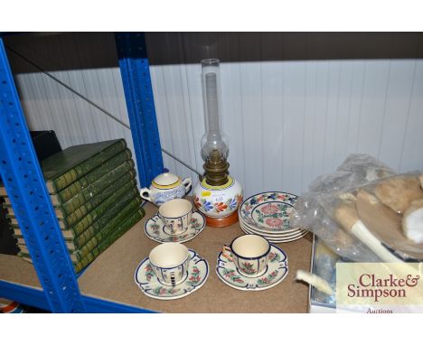 A quantity of Quimper items to include an oil lamp with glass chimney