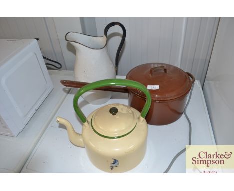 An enamel kettle, jug and saucepan