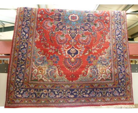 Large Red ground oriental carpet