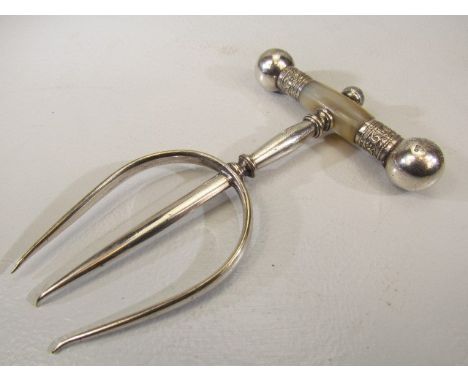 Unusual silverplated fork with mother of pearl handle and decorated ball finials
