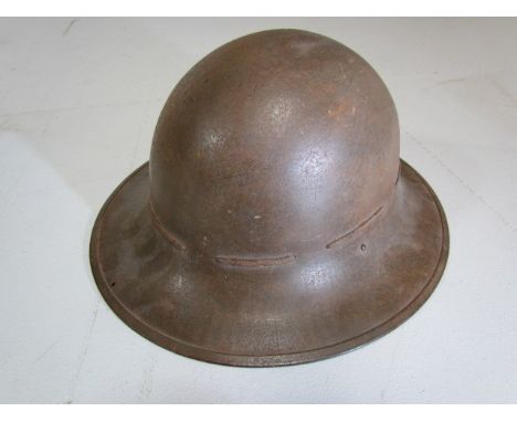 Military interest: Metal helmet with lace detail and liner