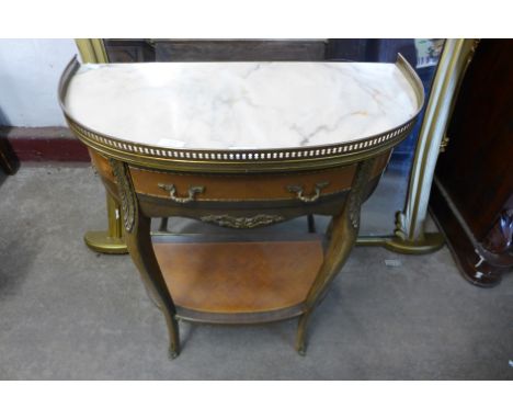 A French style mahogany, gilt metal and marble topped console table 