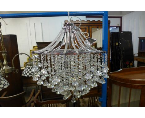 A crystal and chrome chandelier 