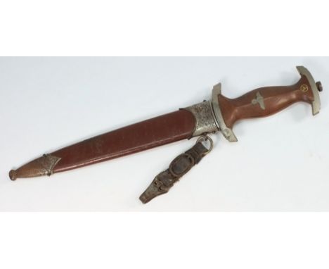 A Third Reich period S A Dagger: with 22cm. blade with motto, hardwood grip, metal scabbard and leather hangar.
