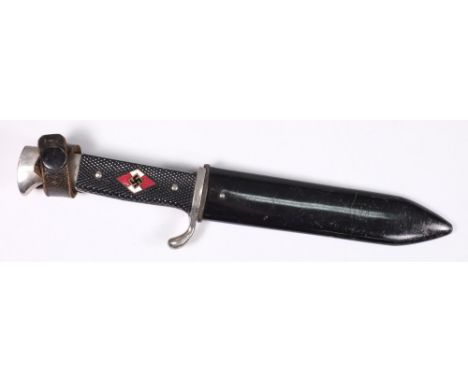 A German HJ knife:, single edged blade, nickel plated hilt and black plastic grips inset enamel insignia, in a steel scabbard