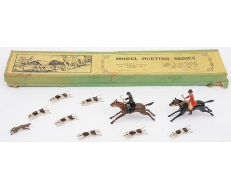 Britain's 'Model Hunting Scenes', No1447 in original box:, comprising huntsman and woman on horseback seven hounds and a fox.