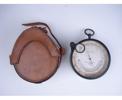 A 3 inch brass compensated barometer by Negretti & Zambra, London, no 17884:, the dial with thermometer and signed as per tit