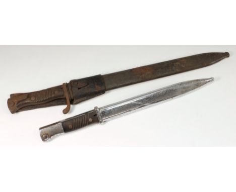 A German World War I Mauser bayonet: contained in a steel scabbard, together with a World War II example (2). 
