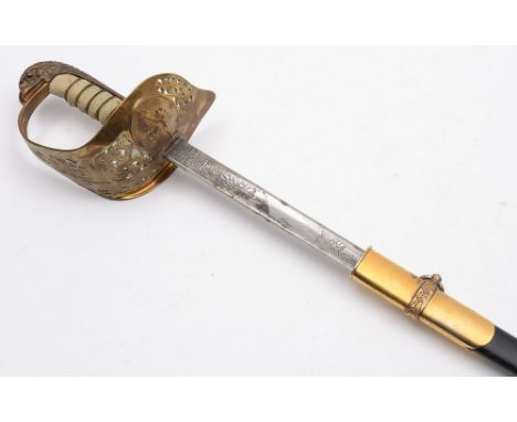 An R.A.F. Officer's dress sword: with 83cm. fullered and etched blade with RAF cypher, gilt brass knuckleguard with pierced f