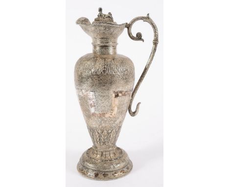 An Indo-Persian white metal ewer with inscription for 10th Foot Regiment (Lancashire):, having Sphinx finial over flared rim 