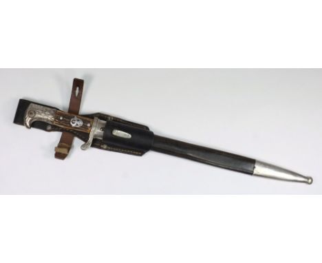 A German WWII Police dress bayonet:, the two piece antler grip set with white metal eagle and swastika within wreath, eagle h