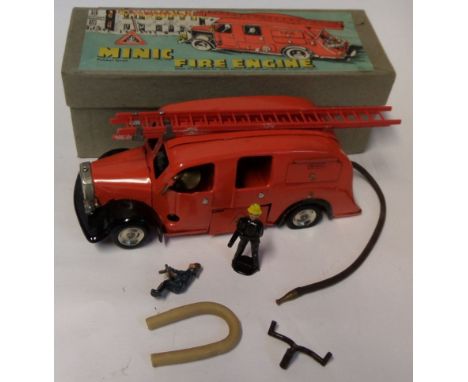 Triang Minic No 62M Fire Engine: tinplate red coachwork, two-section plastic ladder, opening side locker, brass bell, and hos