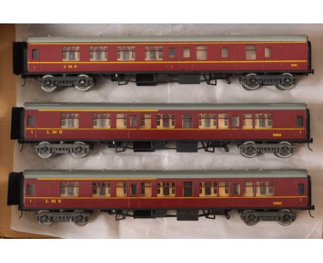 Lima, three LMS passenger coaches: includes 1st brake Coach No 5051 and two 1st Corridor Coaches, all unboxed.

