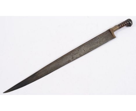 An Indo -Persian Khyber knife:, the 24 inch T -section blade with brass hilt and wooden grip, lacking scabbard.