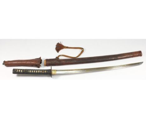 A WWII period Japanese wakizashi:, the blade with double fuller to shiogi-ji, oval pierced tsuba, dragon fuchi over same with