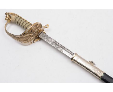 A modern Naval officers dress sword: with 78cm fullered blade with fouled anchor cypher, gilt brass knuckle guard with foldin