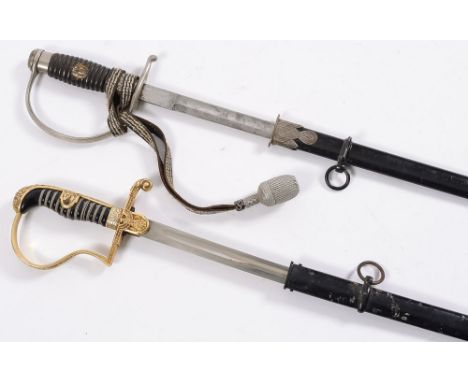 A German Army Officers sword by Puma, and a German Police sword by 'Herm, Rath, Solingen':, the army sword with fullered blad