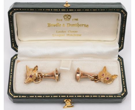 A pair of 9ct gold fox mask and hunting horn cufflinks for Boodle and Dunthorne, London:, the fox mask with gemset eyes.